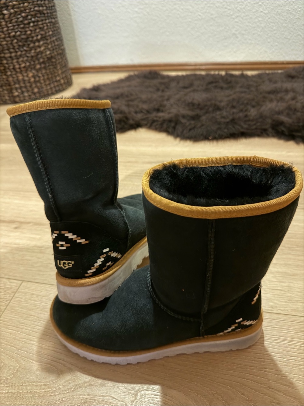 UGG Women’s Black Suede Insulated Boot with Tan Trim